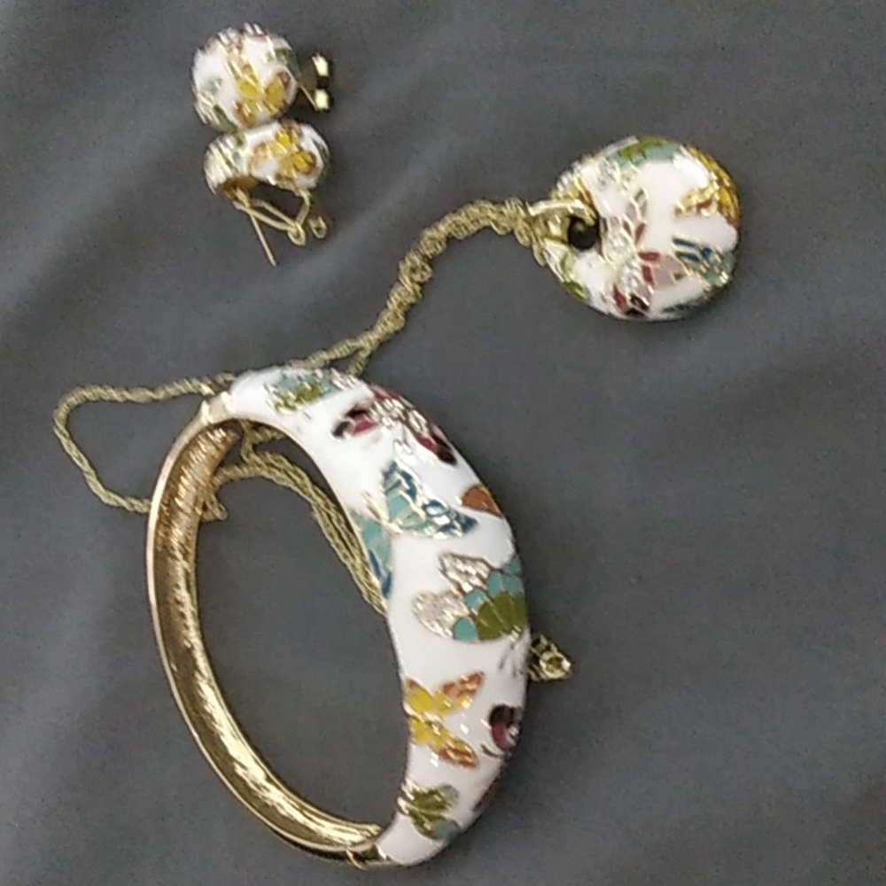Enamel and gold tone butterfly (jtv?) set
